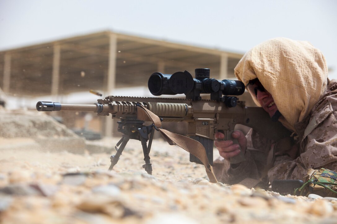 A 26th Marine Expeditionary Unit (MEU) Maritime Raid Force Marines fires a M110 Semi-Automatic Sniper System while conducting a marksmanship training exercise at a range in Qatar, April 22, 2013.  Eagle Resolve is an annual multilateral exercise designed to enhance regional cooperative defense efforts of the Gulf Cooperation Council nations and U.S. Central Command. The 26th MEU is deployed to the 5th Fleet area of operations aboard the Kearsarge Amphibious Ready Group. The 26th MEU operates continuously across the globe, providing the president and unified combatant commanders with a forward-deployed, sea-based quick reaction force. The MEU is a Marine Air-Ground Task Force capable of conducting amphibious operations, crisis response and limited contingency operations. (U.S. Marine Corps photo by Cpl. Christopher Q. Stone, 26th MEU Combat Camera/Released)