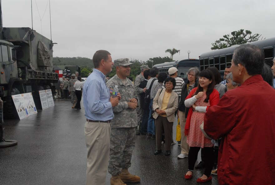 Okinawan clergy viewed a Patriot missile launcher static display and other U.S. Army contingency support vehicles during a visit to Kadena Air Base, Japan, April 19, 2013.  Several Christian denominations and six Okinawa prefectures were represented by the visiting religious leaders.  (U.S. Air Force photo by Staff Sgt. Lauren Snyder/Released)