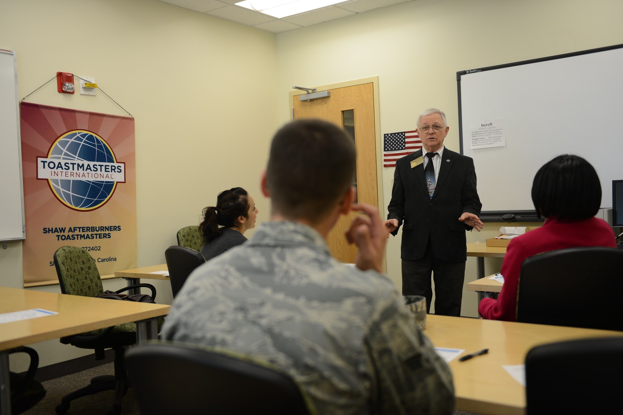 Douglas Wilson, a member of Shaw Afterburners Toastmasters Club, recites a speech he wrote, called ‘Metamorphosis,’ during a Toastmasters meeting at McElveen Resource Center’s conference room at Shaw Air Force Base, S.C., April 18, 2013. Shaw Afterburners meet every Thursdays at 11:30 a.m. The Toastmasters are an educational organization that is designed to help people develop their communication skills. (U.S. Air Force photo by Airman 1st Class Krystal M. Jeffers/Released)