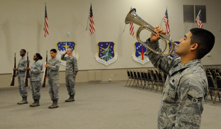 Airman 1st Class Eric Sanchez, 2nd Logistics Readiness Squadron, practices playing "Taps" during Honor Guard training on Barksdale Air Force Base, La., April 23, 2013. The bugle call dates back to the late 1800s and signals that the duty day is done, but more importantly brings closure of the deceased's military career. (U.S. Air Force photo/Airman 1st Class Andrew Moua)