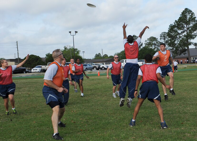 Airmen with the 23d Maintenance Operations Squadron and 23d Aircraft Maintenance Squadron participate in the 23d Maintenance Group sports day at Moody Air Force Base, Ga., April 19, 2013. Games such as softball, soccer, bean bag tossing and tug-of-war were included along with a 23d MXG cook-out.  (U.S. Air Force photo by Senior Airman Eileen Meier/Released)