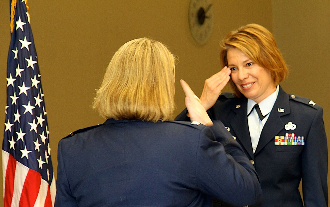 Col. Kate Russel (right) returns a salute to Col. Connie Jenkins right after Russel's promotion to colonel on  April 14, 2013.  Russel is current commander of the 932nd Force Support Squadron and Jenkins commands the 932nd Mission Support Group.  The 932nd Airlift Wing is an Air Force Reserve unit that flies the C-40C. (U.S. Air Force photo/Tech. Sgt. Christopher Parr)
