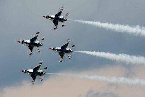 The Thunderbird Diamond formation performs the Bottom-Up Pass during an air show performance in Titusville, Fla., March 25, 2013.The commander of Air Combat Command, Gen. Mike Hostage III, has officially selected the officers who will be joining the United States Air Force Thunderbirds for the 2014 demonstration season. (U.S. Air Force photo byTech. Sgt. Manuel J. Martinez/Released)