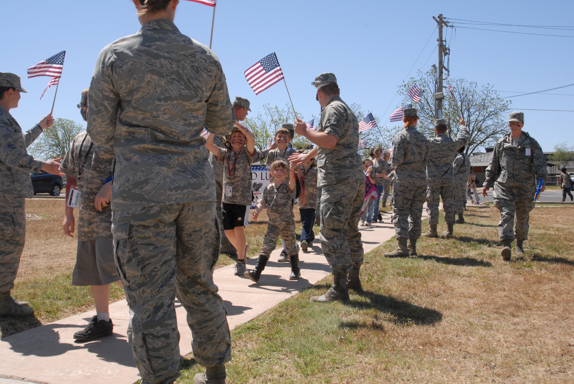 GOODFELLOW AIR FORCE BASE, Texas – The children were welcomed home to Building 901, here, after their deployment, April 20, during Operation Kids Investigating Deployment Services. The annual event gave children the chance to experience deployment for a better understanding of what their parents do when deployed. (U.S. Air Force photo/ Airman 1st Class Breonna Fields) 
