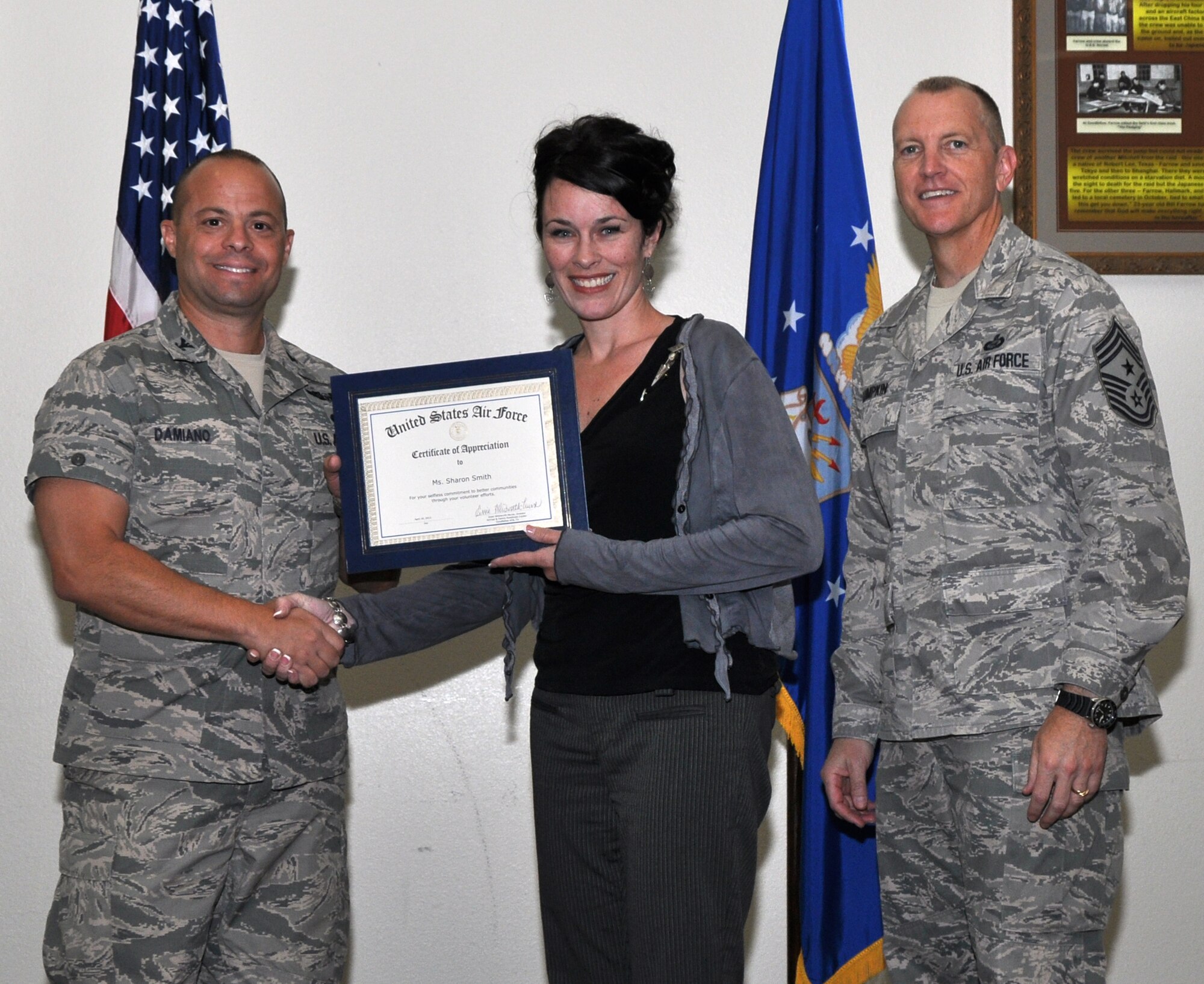 GOODFELLOW AIR FORCE BASE, Texas – Col. Mark Damiano, 17th Training Wing presents Sharon Smith, Team Goodfellow spouse, with the Volunteer Excellence Award at the Event Center here, April 18. This award recognizes federal civilian employees, family members, federal civilian retirees and military retirees who perform outstanding volunteer community service, which has an impact on the community. (U.S. Air Force photo/ Airman 1st Class Joshua Edwards)
