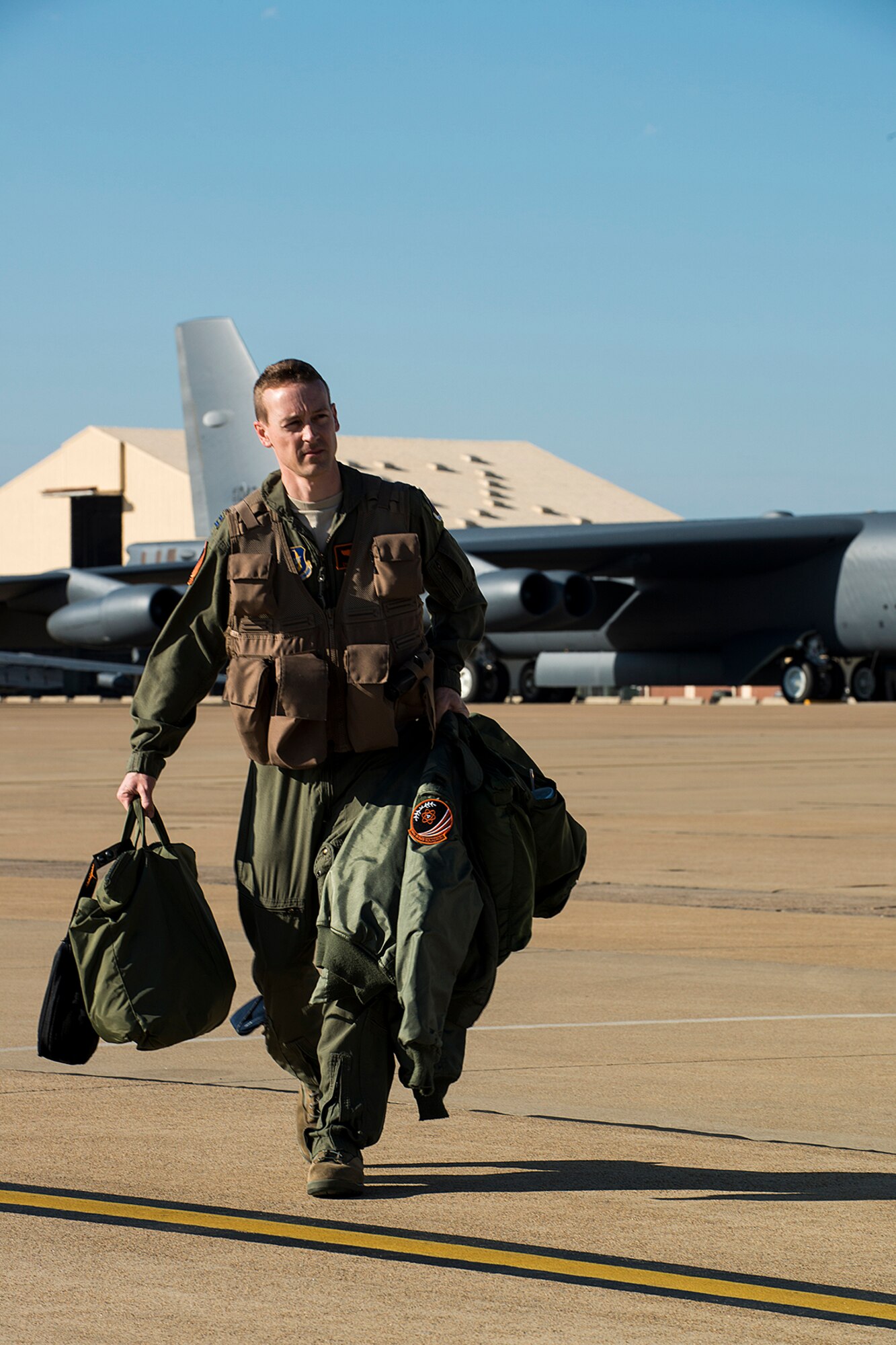 U.S. Air Force Capt. Chris Robinson, 343rd Bomb Squadron pilot, prepares to board a 2nd Bomb Wing B-52H Stratofortress at Barksdale Air Force Base, La., in support of a nuclear exercise at Minot AFB, N.D., April 19, 2013. The 343rd BS is the only nuclear certified squadron in the Air Force Reserve and this will be their first time to participate in a nuclear exercise. (U.S. Air Force photo by Master Sgt. Greg Steele/Released)