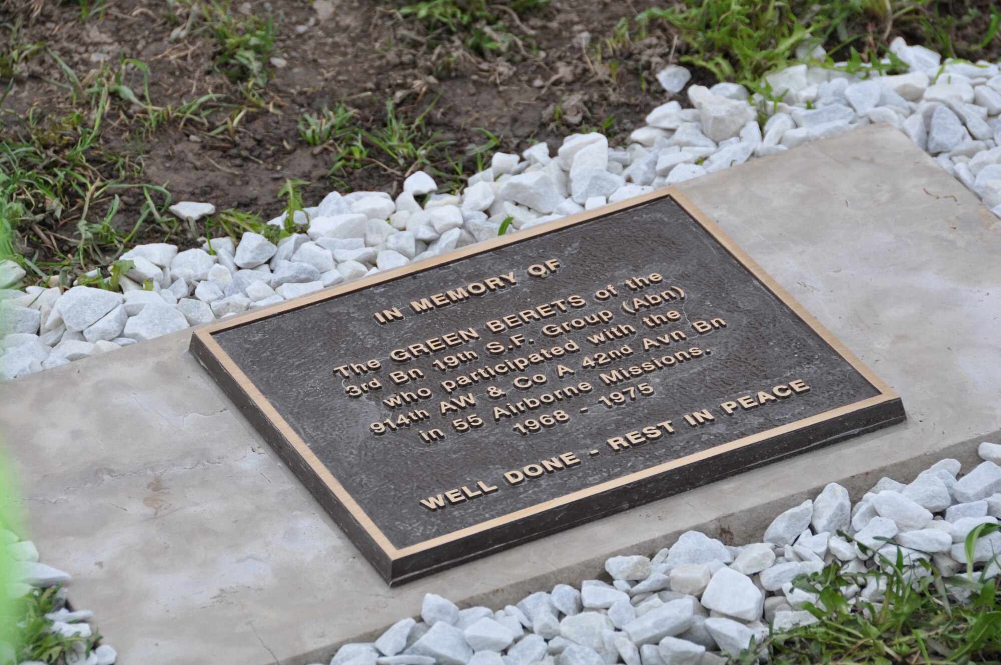 Members of the 3rd Battalion, 19th Special Forces Group and their families gather together April 20 at the Niagara Falls Air Reserve Station, N.Y. to take part in a tree dedication ceremony in honor of the unit.  A plaque was placed at the foot of the tree to recognize the green berets who participated with the 914th Airlift Wing and the 42nd Aviation Battalion in 55 airborne missions from 1968 to 1975.  (U.S. Air Force photo by Master Sgt. Kevin Nichols)