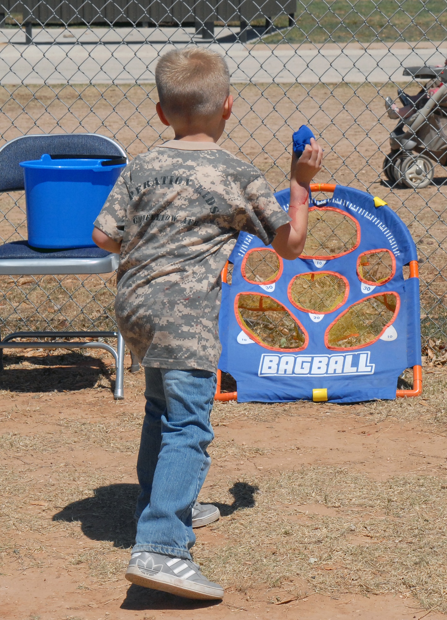 GOODFELLOW AIR FORCE BASE, Texas—A youth aims a bean bag at his target during Children’s Fest, at the baseball field behind the Youth Center, here, April 20. Children’s Fest is a family-fun event sponsored by the Goodfellow Air Force Base Youth Center. (U.S. Air Force photo/1st Lt. Leanne Hedgepeth) 