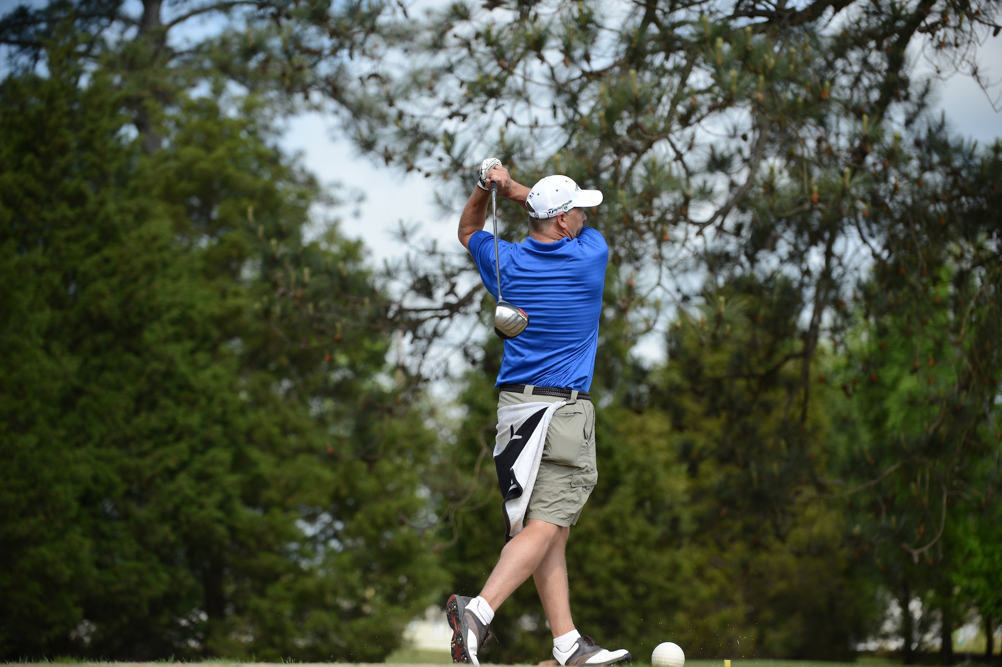 Mark Webster, uses his driver to hit the ball for distance during the “5th Annual John K. Crosswell Charity Golf Tournament” held at Shaw Air Force Base, S.C., April 19, 2013. The tournament was held to raise money for the Crosswell organization whose goal is to provide a loving, nurturing environment for children and families in need. All the proceeds from the event went to further this cause. (U.S. Air Force photo by Airman 1st Class Daniel Blackwell/Released)