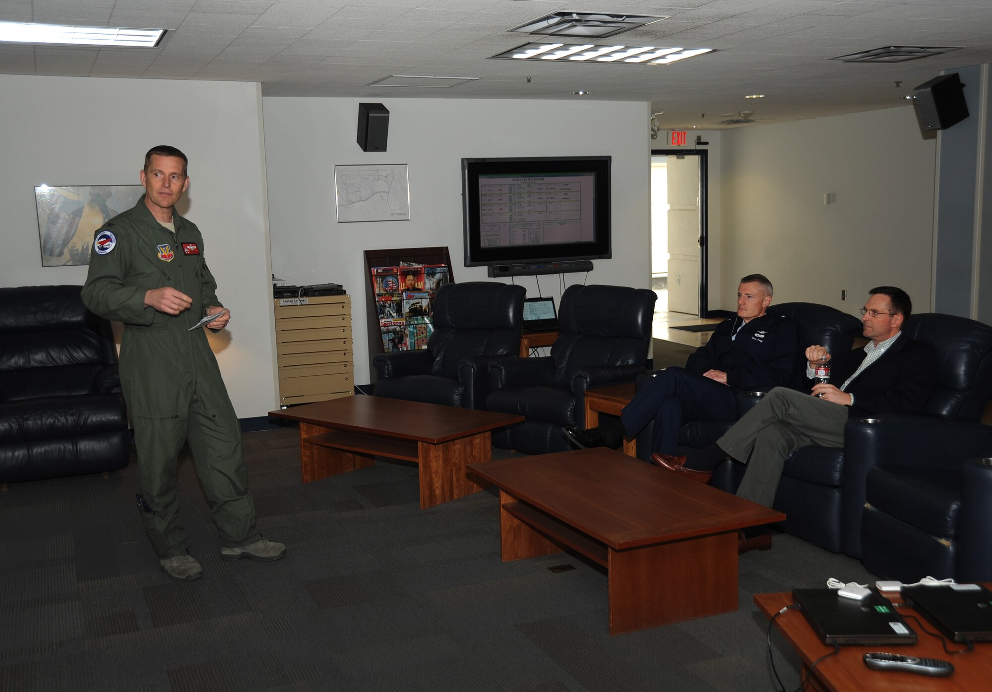 Air Force Col. Rick Wedan, 142nd Fighter Wing Commander gives a briefing to Brig. Gen. Steven Gregg, Commander of the Oregon Air National Guard and Lt. Gen. Joseph L. Lengyel, Vice Chief, National Guard Bureau, during his visit to the Portland Air National Guard Base, Portland, Ore., April 18, 2013. (Air National Guard photo by Air Force Tech. Sgt. John Hughel, 142nd Public Affairs Office)