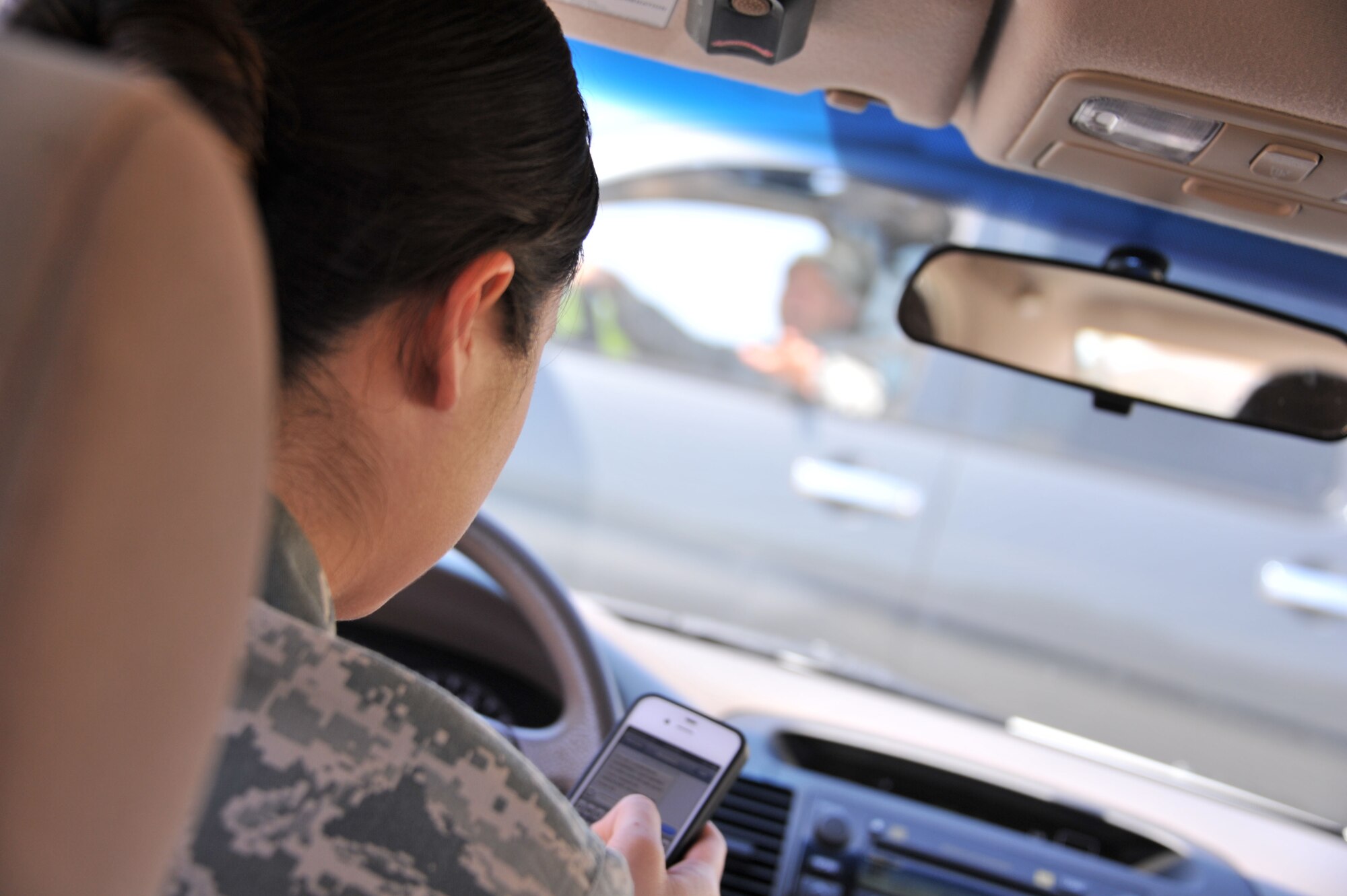 According to the national highway traffic safety administration, sending or receiving a text takes a driver's eyes from the road for an average of 4.6 seconds, the equivalent-at 55 mph-of driving the length of an entire football field, blind. (U.S. Air Force illustration by Airman 1st Class William Blankenship)