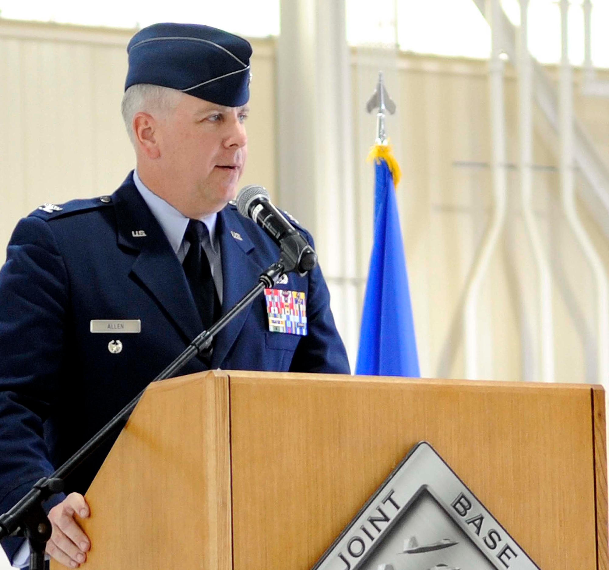 Col. John J. Allen Jr., 633rd Air Base Wing commander, addresses the audience during a change of command ceremony at Langley Air Force Base, Va., April 22, 2013. Allen assumed command of the wing from Col. Korvin D. Auch. (U.S. Air Force photo by Staff Sgt. Dana Hill/Released)