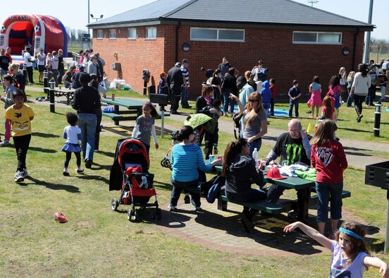 RAF Mildenhall families participate in activities during the RAF Mildenhall Child Development Center and Airmen and Family Readiness Center Spring Fest and Child Find event April 20, 2013, at RAF Mildenhall, England.  The three-hour event offered games and activities for children, including a bouncy house, ring toss and a dunk tank.  (U.S. Air Force photos by Staff Sgt. Tabitha M. Lee/Released)