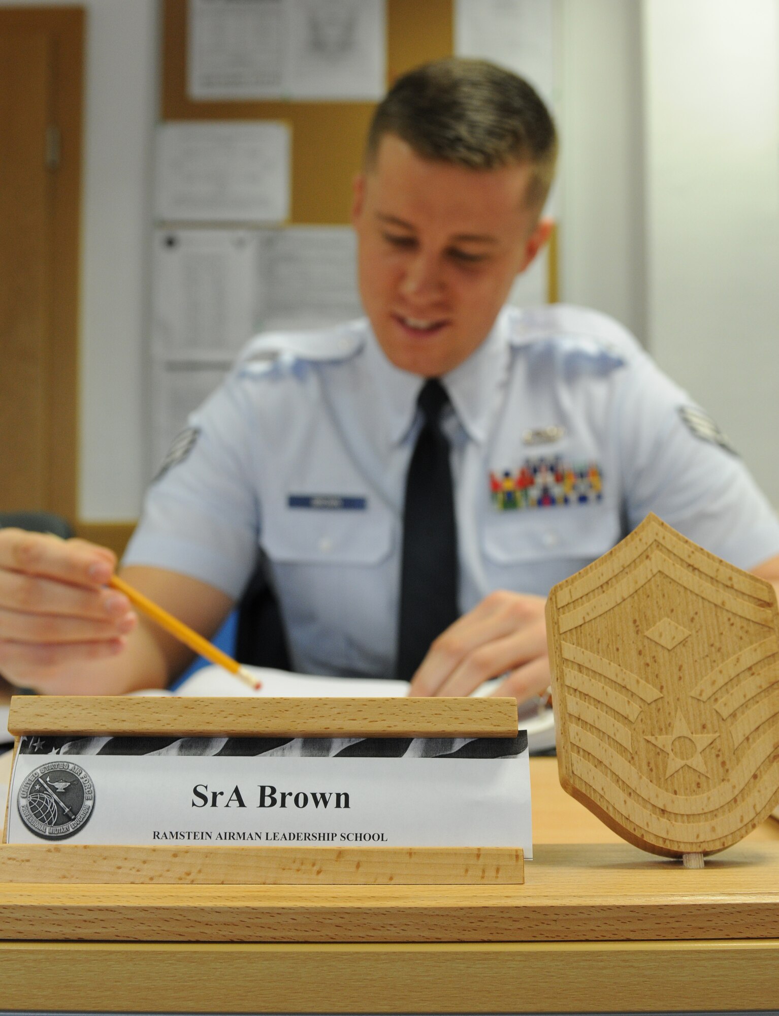 Senior Airman Matthew Brown, 86th Munitions Squadron munitions system technician, reads information about operations security during an airman leadership class block of study, April 22, 2013, Kapaun, Germany. Brown was recently awarded the Conventional Munitions Systems Maintainer Technician of the Year for U.S. Air Forces in Europe and Air Forces Africa. (U.S. Air Force photo/Airman 1st Class Holly Cook)