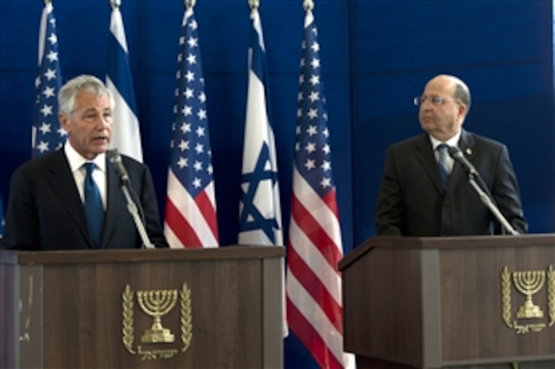 Secretary of Defense Chuck Hagel, left, conducts a joint press conference with Israeli Minister of Defense Moshe Ya'alon in Tel Aviv, Israel, on April 22, 2013.  Hagel and Ya'alon answered questions regarding Iran's attempts at producing a nuclear weapon as well as the civil war in Syria.  Hagel will spend several days in Israel meeting with counterparts on a six-day trip to the Middle East.  