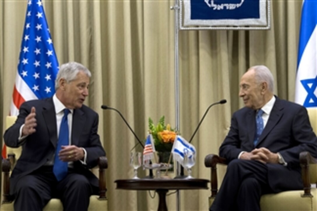 Secretary of Defense Chuck Hagel, left, meets with Israeli President Shimon Peres in Jerusalem, Israel, on April 22, 2013.  Hagel met with Peres on his second full day in Israel.  Hagel will spend several days in Israel meeting with counterparts on a six-day trip to the Middle East.  
