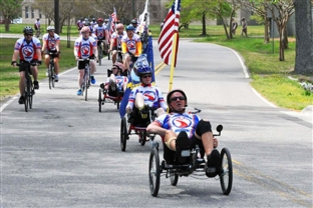 Cyclists compete in the adaptive cycling event during the Warrior Ride at Joint Expeditionary Base Little Creek in Virginia Beach, Va., April 18, 2013.