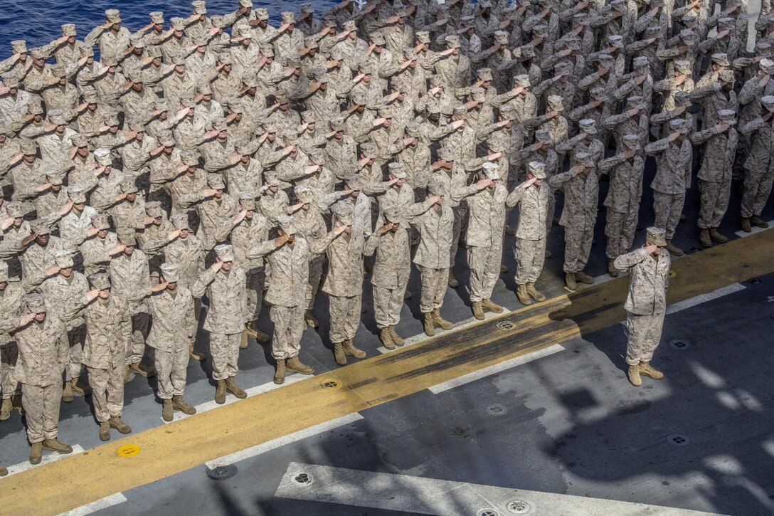 U.S. Marines and Sailors with the 26th Marine Expeditionary Unit conduct a birthday cake cutting ceremony to celebrate the MEU’s 46th birthday aboard the amphibious assault ship USS Kearsarge (LHD 3), April 24, 2013.  The 26th MEU is deployed to the 5th Fleet area of operations aboard the Kearsarge Amphibious Ready Group. The 26th MEU operates continuously across the globe, providing the president and unified combatant commanders with a forward-deployed, sea-based quick reaction force. The MEU is a Marine Air-Ground Task Force capable of conducting amphibious operations, crisis response and limited contingency operations. (U.S. Marine Corps photograph by Gunnery Sgt. Michael Kropiewnicki/26th MEU Combat Camera/Released)