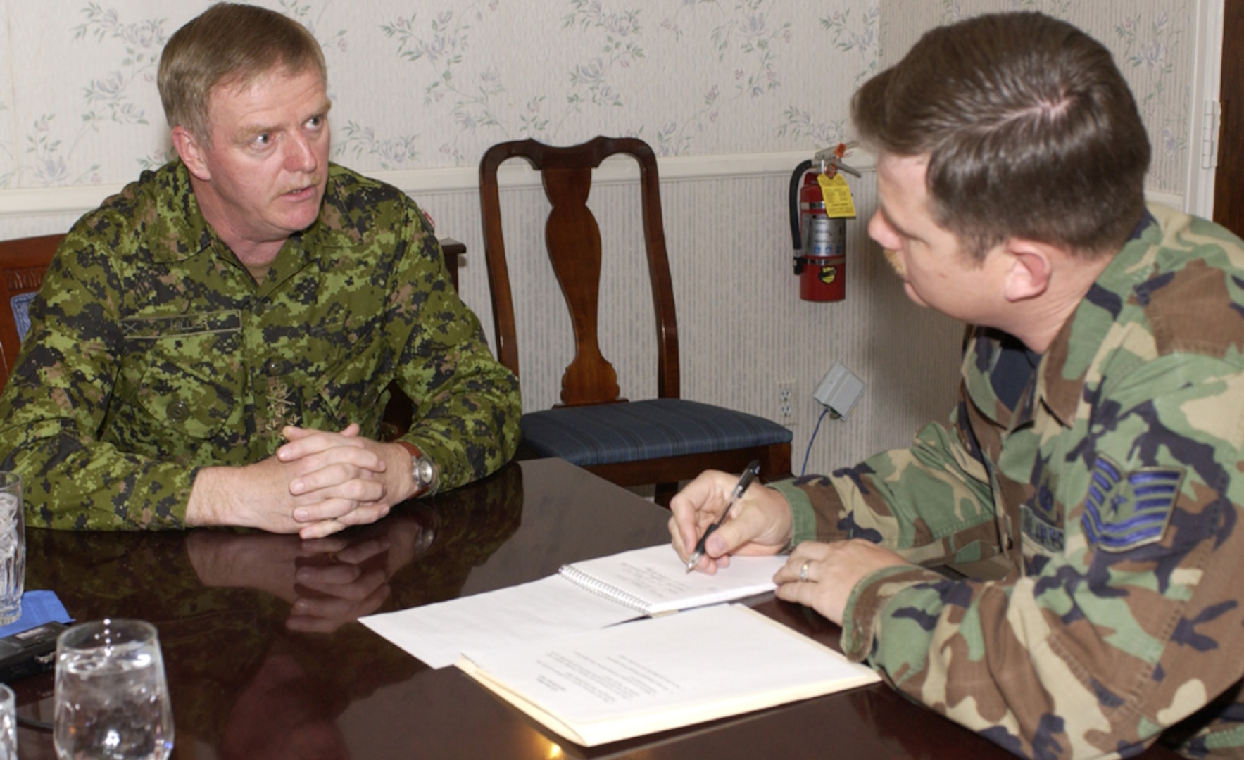 During Gen. Rick Hillier's first visit to Colorado Springs as Chief of Defence Staff, he takes a few minutes to talk with Tech. Sgt. Devin Fisher of NORAD and USNORTHCOM Public Affairs about Canada-U.S. Relations Photo by Sgt. 1st Class Gail Braymen 
