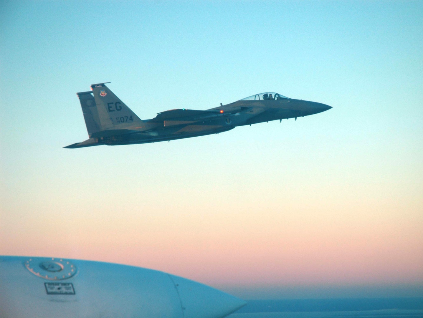 A 33d Fighter Wing F-15C Eagle flies alongside a C-310 Cessna Feb. 7, during an Operation Noble Eagle training mission.  The F-15 is there to alert the civilian aircraft that it is in restricted airspace.  The 33 FW has been supporting ONE since Sept. 11, 2001, most recently providing Combat Air Patrol for President George W. Bush during the State of the Union address.