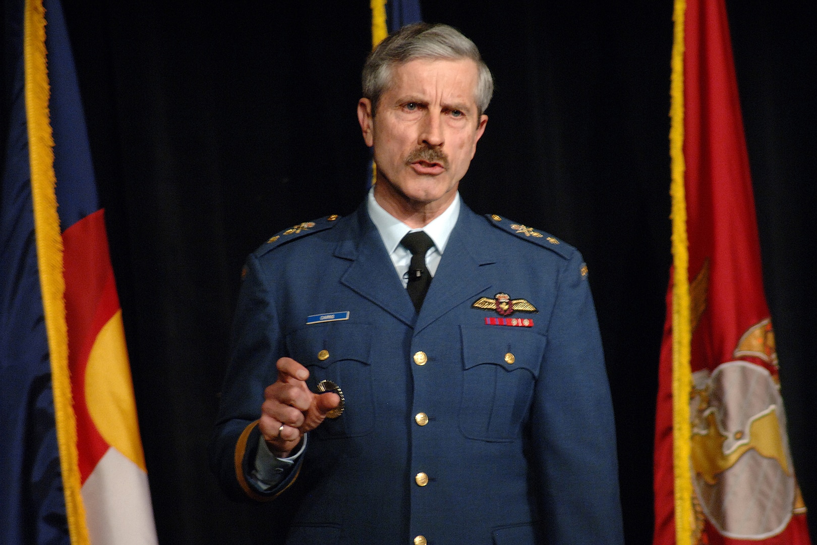 Maj.-Gen. Brett D. Cairns, Operations director for North American Aerospace Defense Command, speaks at the Defending America/SPACECOMM 2007 Symposium Jan. 24 in Colorado Springs, Colo. The symposium is a forum for government and industry experts in the command, control, communications, computers, intelligence, surveillance and reconnaissance domains. Photo by Sgt. 1st Class Gail Braymen 