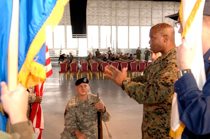 Sgt. Maj. D. Scott Frye, Senior Enlisted Advisor of NORAD and USNORTHCOM, gestures to Color Guard members during a rehearsal for the NORAD and USNORTHCOM change of command March 23. Frye retires March 30 after 32 years of service in the U.S. Marine Corps. Photo by Petty Officer 1st Class Joaquin Juatai 