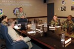 Command Sgt. Maj. Daniel R. Wood, command senior enlisted leader of North American Aerospace Defense Command and U.S. Northern Command, leads a discussion with the commands' senior enlisted troops. Wood, a 26-year Army veteran, assumed his position at NORAD and USNORTHCOM March 26. Photo by Sgt. 1st Class Gail Braymen 