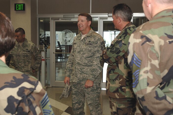 Chief Master Sergeant of the Air Force Rodney McKinley talks with several NORAD and USNORTHCOM senior enlisted personnel during a visit to the commands' headquarters June 6. McKinley received several command briefings and met with the senior enlisted from each service before an all Airmen's call at the Peterson Air Force Base theater. Photo by Petty Officer 1st Class Joaquin Juatai 