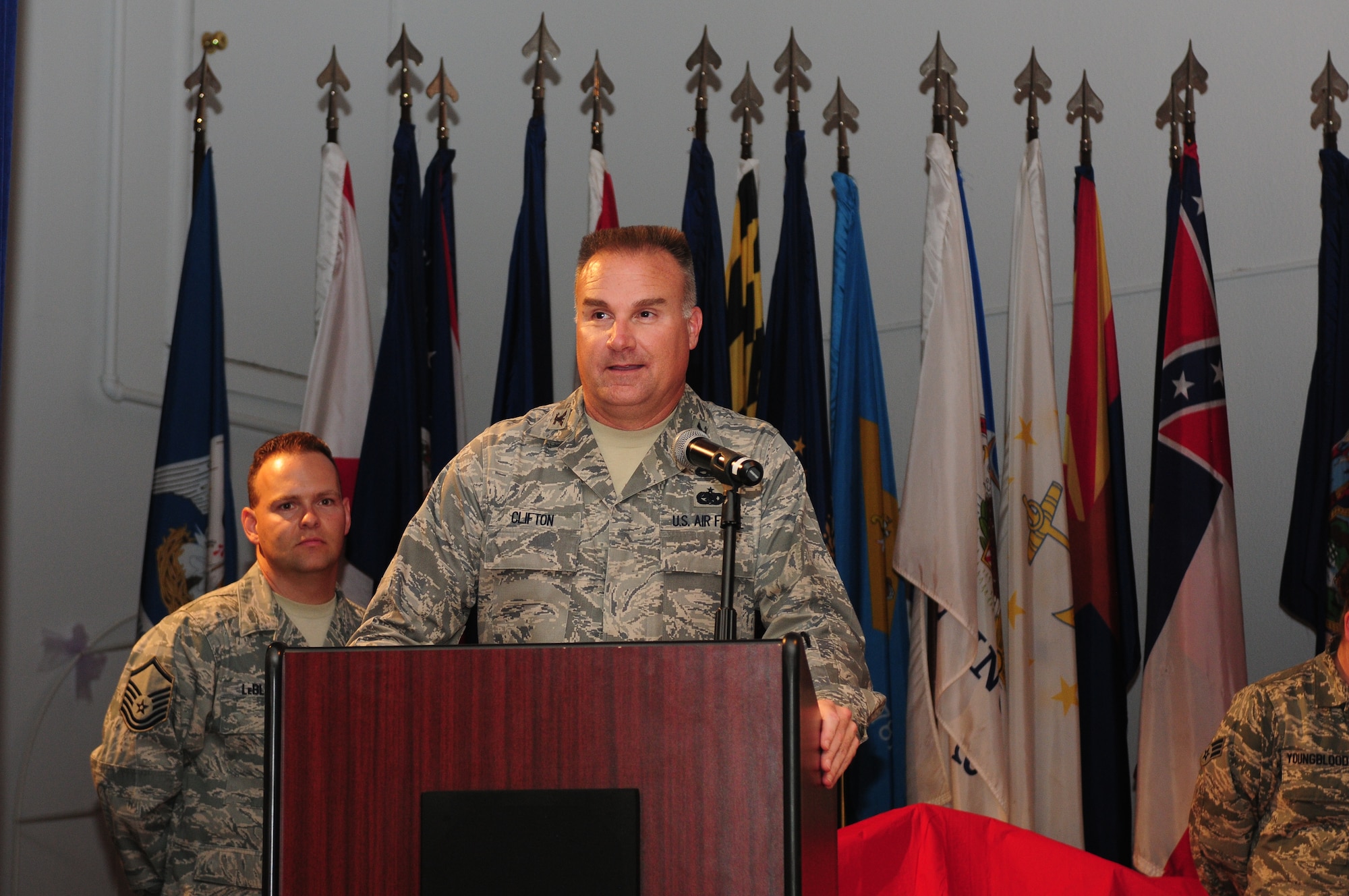 Col. Chad Clifton, 9th Maintenance Group commander, speaks to his maintainers during the Maintenance Professional of the Year banquet at the Community Activity Center on Beale Air Force Base, Calif. April 19, 2013. Col. Phil Stewart, 9th Reconnaissance Wing commander, was the guest speaker. (U.S. Air Force photo by Senior Airman Allen Pollard/Released)