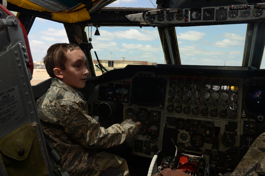 Hunter Tomlin, 8, sits in the cockpit of a B-52H Stratofortress on Barksdale Air Force Base, La., April 24, 2013. Tomlin was made an honorary B-52 crew chief and was given a tour of daily crew chief operations. (U.S. Air Force photo/Senior Airman Micaiah Anthony)
