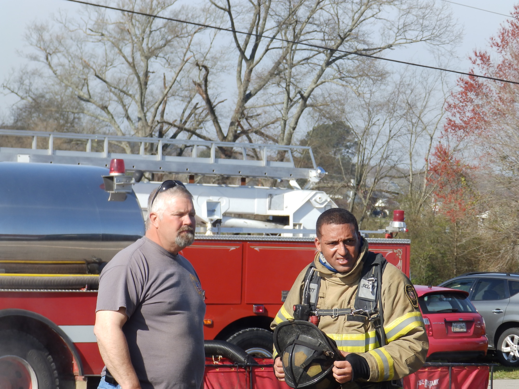 From left, Hillsboro Volunteer Fire Department Chief Jerry Brown and AEDC Fire Department Assistant Chief of Operations and Hillsboro Volunteer Fire Department team member George DeShields, conduct an after-action brief upon completion of a live fire exercise during the recent 2nd Annual Multi-County Live Burn Weekend at the Hillsboro Park. (Photo provided)