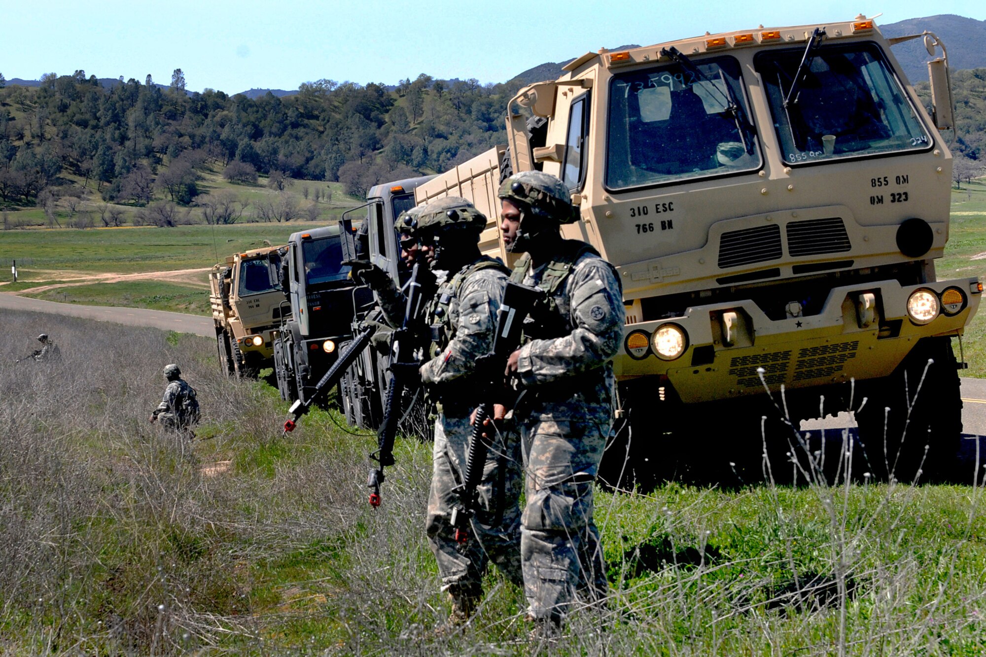 FORT HUNTER LIGGETT, Calif. -- U.S. Army Soldiers with the 855th Quartermaster Company perform tactical convoy reconnaissance training March 16 at Fort Hunter Liggett, Calif. The convoy was part of the 2013 Warrior Exercise, a joint exercise which simulated nation-building necessities that could follow large-scale combat operations. (U.S. Army photos/Spc. Feleshia D. Dyer)