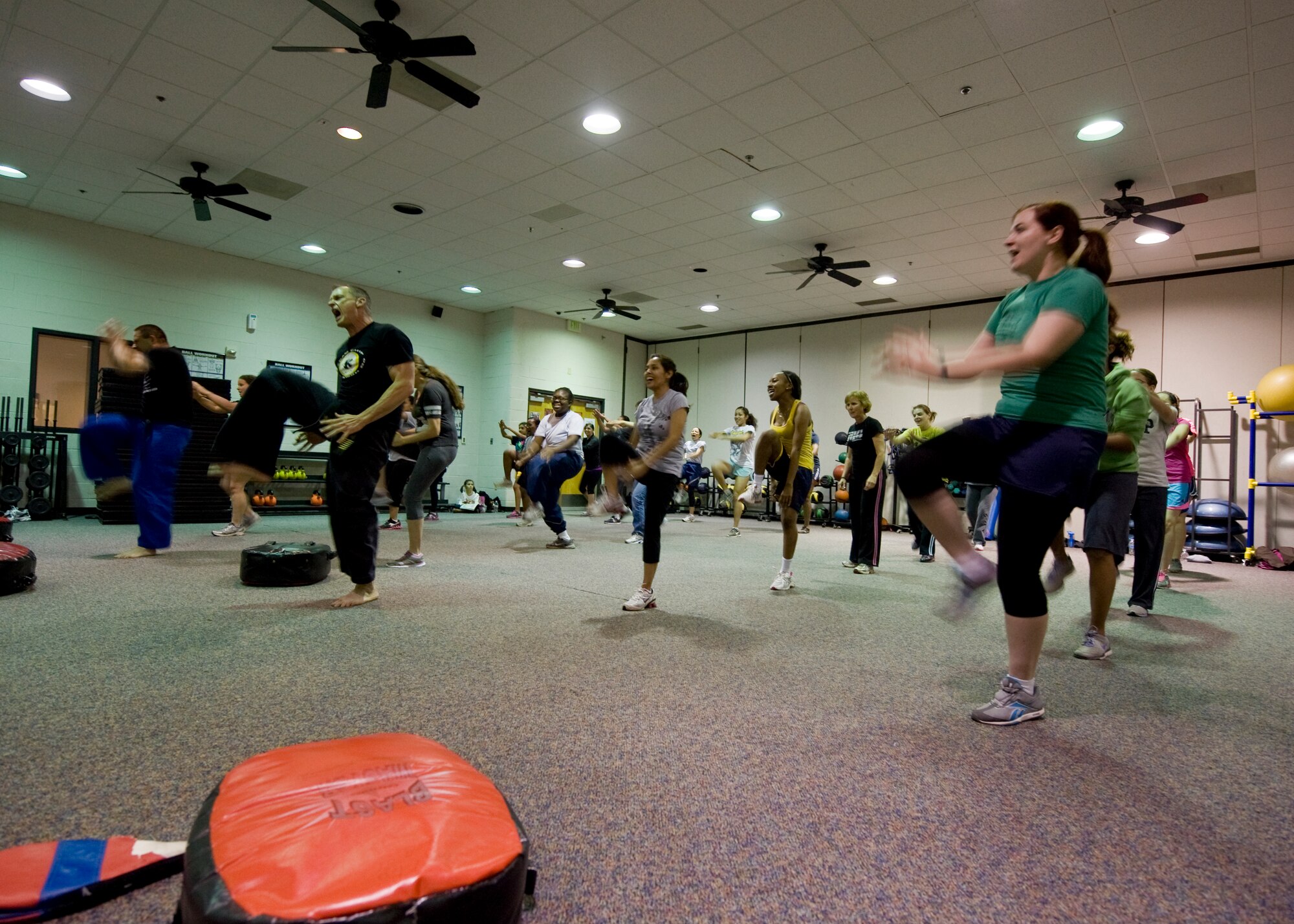Several women participate in a self-defense class April 18, 2013, at Dyess Air Force Base, Texas. The goal of the class was to teach individuals with no martial arts experience basic self-defense moves and how to fight back in a hostile situation. (U.S. Air Force photo by Airman 1st Class Jonathan Stefanko/ Released)
