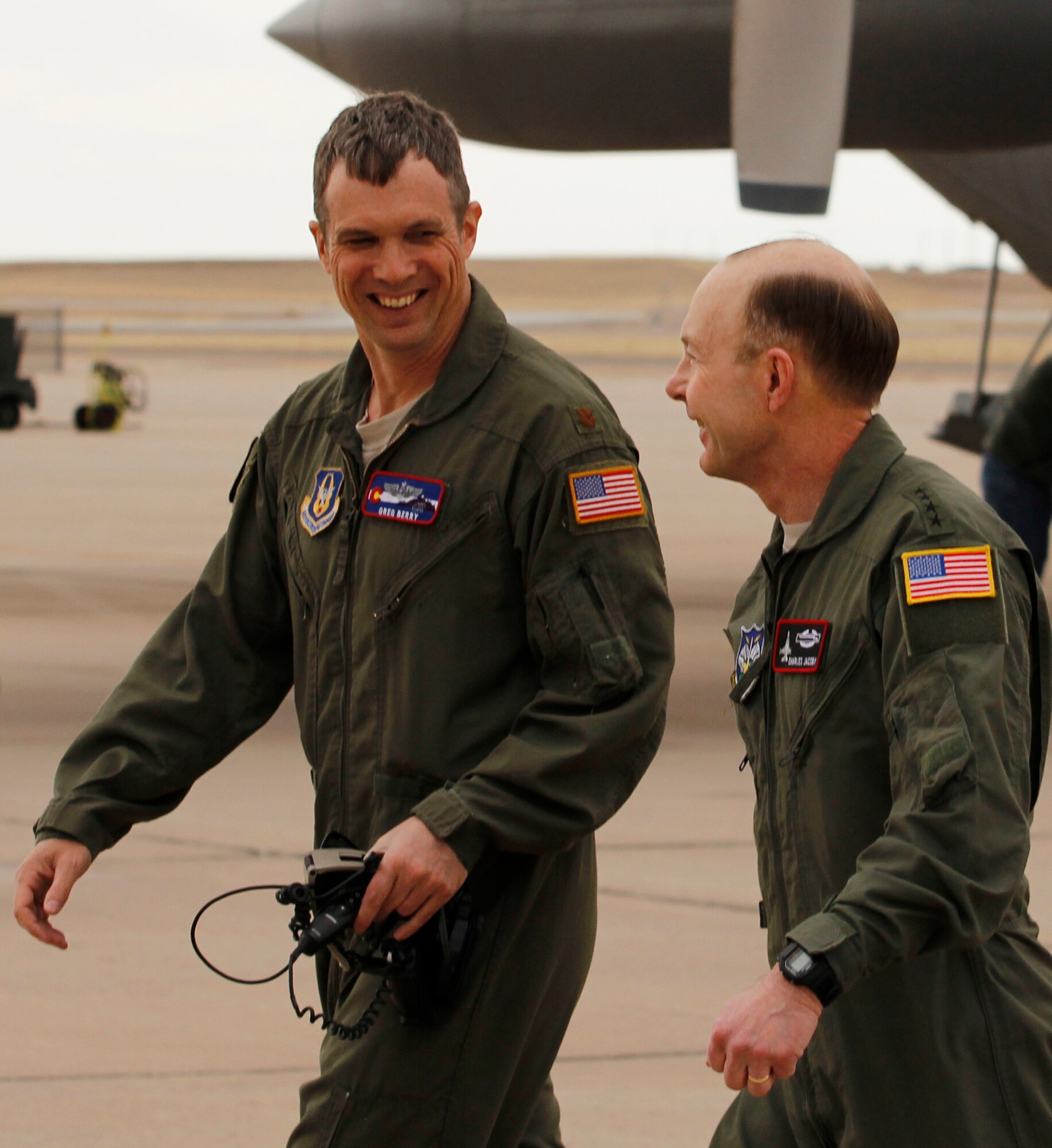 U.S. Army Gen. Charles H. Jacoby, Jr., commander, North American Aerospace Defense Command and United States Northern Command, right, talks with Maj. Greg Berry, 302nd Airlift Wing C-130 Modular Airborne Fire Fighting System mission commander, after a training flight in a MAFFS-equipped C-130 aircraft April 22. The Air Force Reserve Command’s 302nd AW held its annual MAFFS certification and re-certification for C-130 aircrews April 19-23. When it is determined MAFFS is needed, the National Interagency Fire Center through U.S. Northern Command requests the DOD's U.S. Air Force resources. These trained military personnel along with the MAFFS equipment are activated to supplement the civilian air tanker program during periods of high wildfire activity throughout the nation. In 2012 the 302nd AW MAFFS-equipped C-130s, aircrew and personnel supported fire suppression operations in 10 states, including drops on the Waldo Canyon fire near Colorado Springs. 2013 marks the 20th year the MAFFS mission has been flown by the Airmen and C-130s of the 302nd AW. (U.S. Air Force photo/Staff Sgt. Nathan Federico)