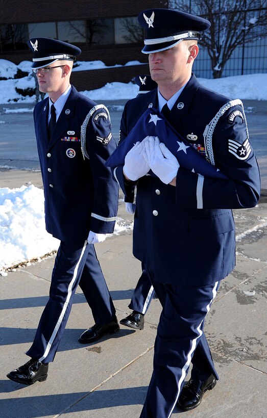 Airman First Class Chase Watkins, and Staff Sgt. Bobby Pantfoeder, 28th Force Support Squadron base Honor Guard members, prepare to raise the flag to half-staff in honor of Maj. Gen. Joseph Brown IV at Ellsworth Air Force Base, S.D., April 23, 2013. Brown, who was stationed at Ellsworth from June 2001 to June 2005, and his wife, Sue S. Brown, were killed April 19 when the Cessna 210 he was piloting crashed in Williamsburg, Va. General Brown has been the commandant of The Dwight D. Eisenhower School for National Security and Resource Strategy in Washington D.C. since October 2010. (U.S. Air Force photo by Airman 1st Class Hrair H. Palyan/Released)