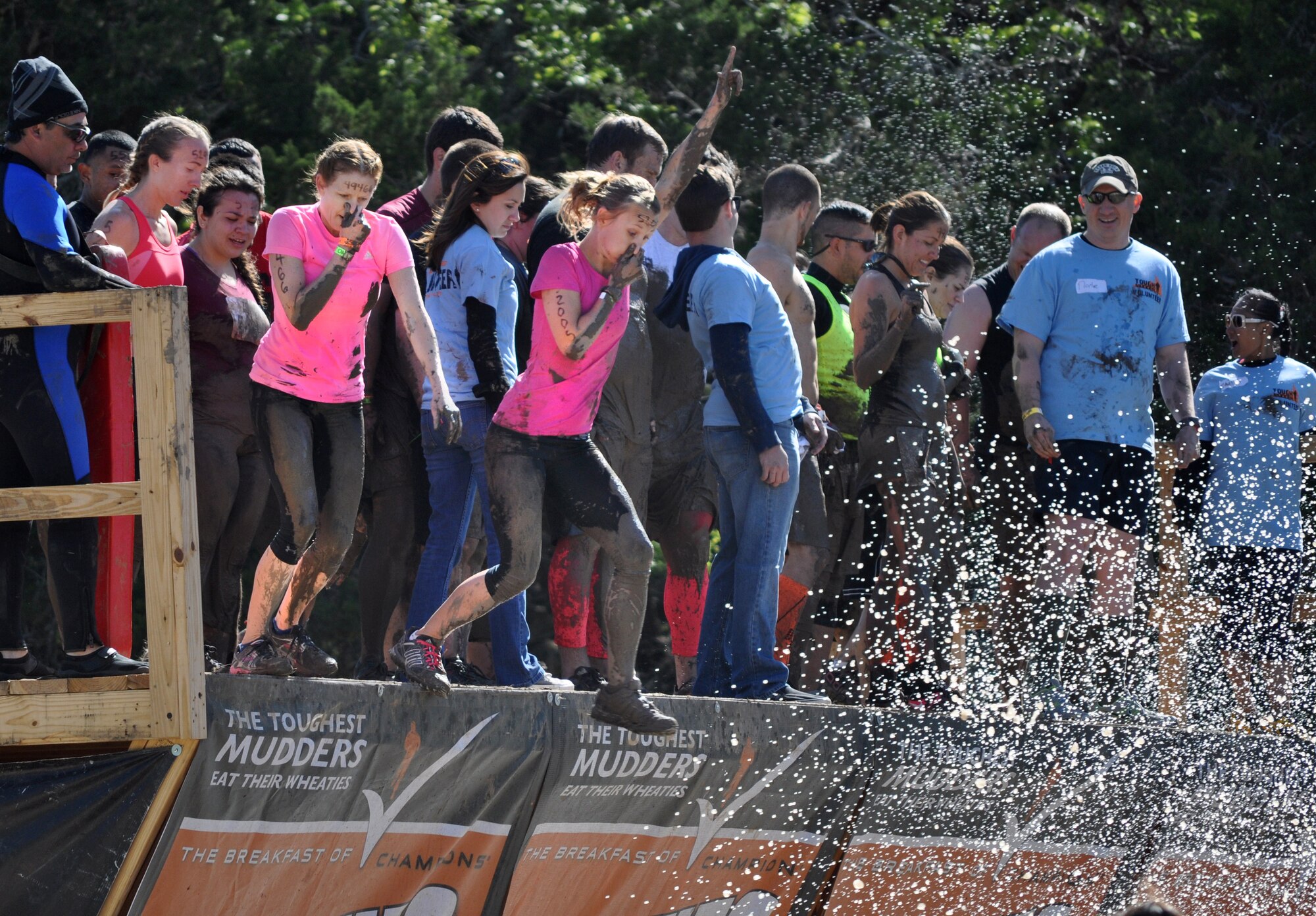 Two 44th Fighter Group members and one active duty 7th Fighter Squadron pilot's spouse from Holloman AFB, New Mexico, competed in the “Tough Mudder” competition in Austin, Texas, Saturday, April 20. They ran more than 10 miles facing 22 military obstacles! The Tough Mudder competition is a strong supporter of the Wounded Warrior Foundation. This edition’s competitors were Senior Master Sgt. Erin Buchanan, 44th FG and 49nd Operations Group aircrew flight equipment superintendent, Master Sgt. Molly Huston, 44th FG first sergeant and Erin Graf, wife of a 7th FS pilot. The 44th FG, at Holloman AFB, New Mexico, is a geographically separated unit of the 301st Fighter Wing located at Naval Air Station Fort Worth Joint Reserve Base, Texas. (Courtesy photo)