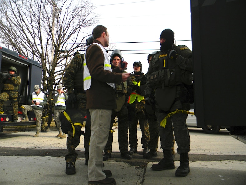 A contractor with Air Force Research Laboratory uses an Android tablet to show SWAT commanders in the field where each SWAT team is located, and to display information from the sensor grid. 


