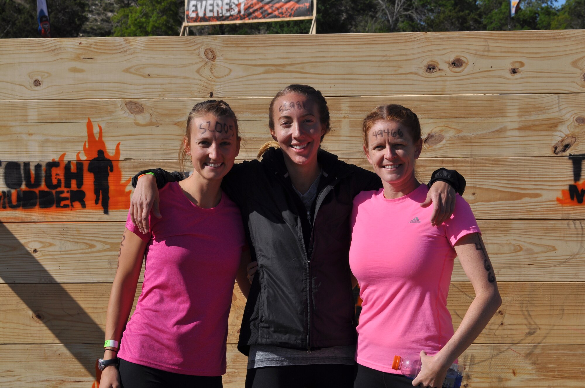 Two 44th Fighter Group members and one active duty 7th Fighter Squadron pilot's spouse from Holloman AFB, New Mexico, competed in the “Tough Mudder” competition in Austin, Texas, Saturday, April 20. They ran more than 10 miles facing 22 military obstacles! The Tough Mudder competition is a strong supporter of the Wounded Warrior Foundation. This edition’s competitors were Senior Master Sgt. Erin Buchanan, 44th FG and 49nd Operations Group aircrew flight equipment superintendent, Master Sgt. Molly Huston, 44th FG first sergeant and Erin Graf, wife of a 7th FS pilot. The 44th FG, at Holloman AFB, New Mexico, is a geographically separated unit of the 301st Fighter Wing located at Naval Air Station Fort Worth Joint Reserve Base, Texas. (Courtesy photo)