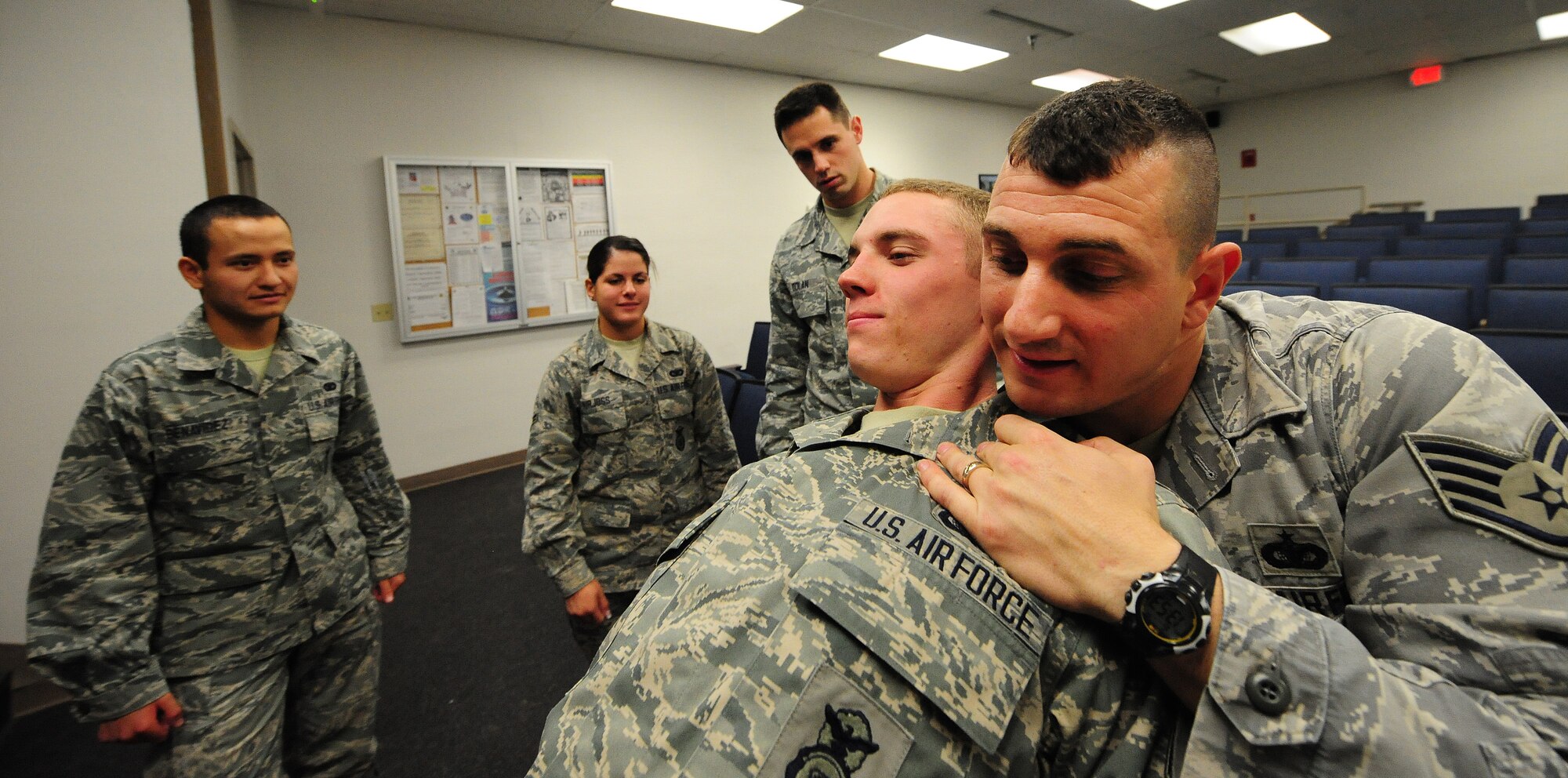 Staff Sgt. Michael Krivitza, 509th Security Forces Squadron Phase I trainer, shows Airmen how to search a suspect during a law enforcement training exercise at Whiteman Air Force Base, Mo., April 16, 2013. Security forces members participate in several different types of training exercises throughout the year to prepare for various threats and base emergencies. (U.S. Air Force photo by Staff Sgt. Nick Wilson/Released)