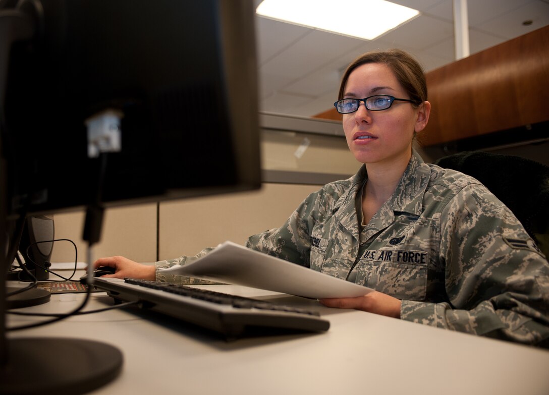 Airman 1st Class Lesley Kriebel, 28th Communications Squadron knowledge operations management technician, enters training data into the Air Force Records Information Management system at Ellsworth Air Force Base, S.D., April 17, 2013. AFRIMS allows Kriebel to keep track of office statistics and ensure Airmen are receiving proper training. (U.S. Air Force photo by Airman 1st Class Alystria Maurer/Released)