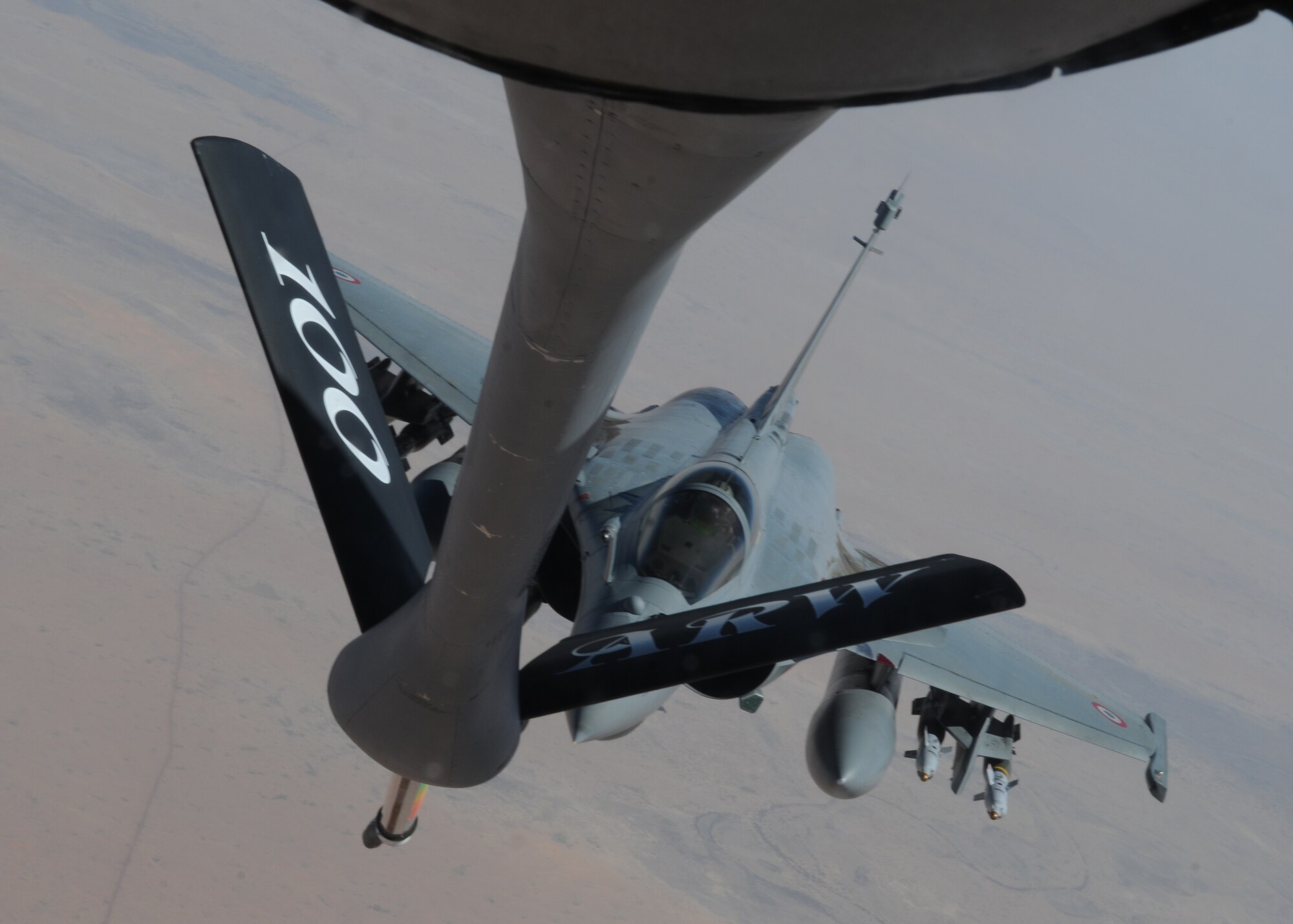 A French Rafale fighter aircraft refuels with a KC-135 Stratotanker April 23, 2013, over Mali. The Stratotankers, from the 100th Air Refueling Wing at RAF Mildenhall, England, have been providing air-to-air refueling for the French since Jan. 27, 2013, and are currently being operated by the 100th’s forward deployed unit, the 351st Expeditionary Air Refueling Squadron. (U.S. Air Force photo by 1st Lt. Christopher Mesnard/Released)