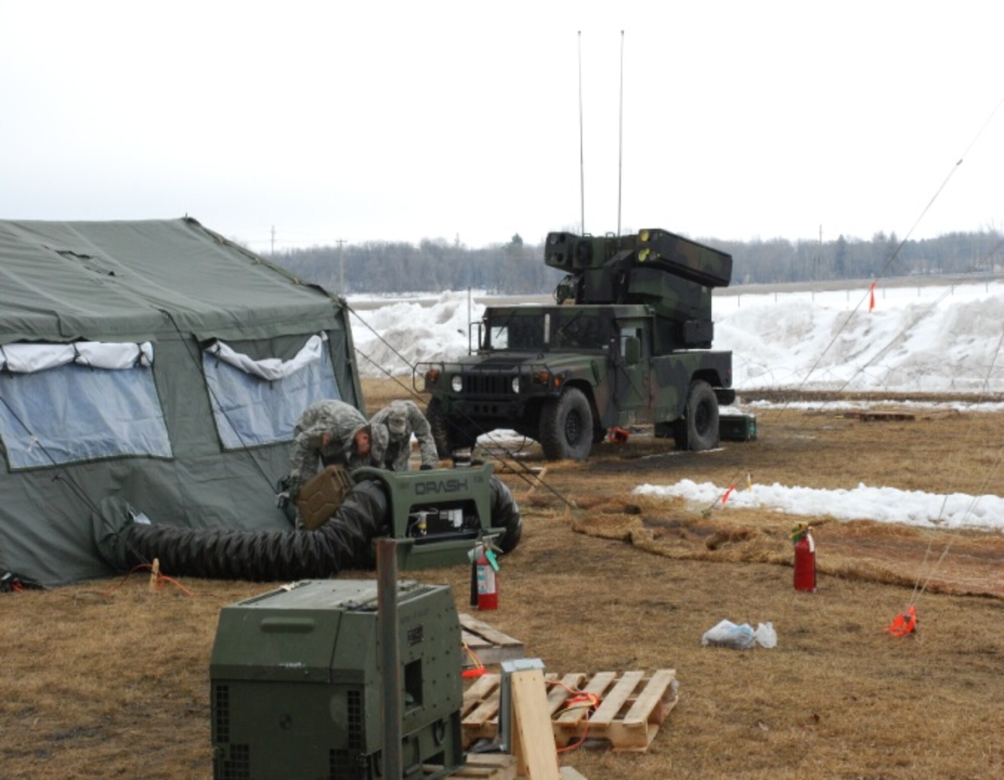 SPC Brandon Koster and SPC Josef Kerr conducting maintenance operations on a Sentinel Radar. US Army photo by CW2 Michael Penley