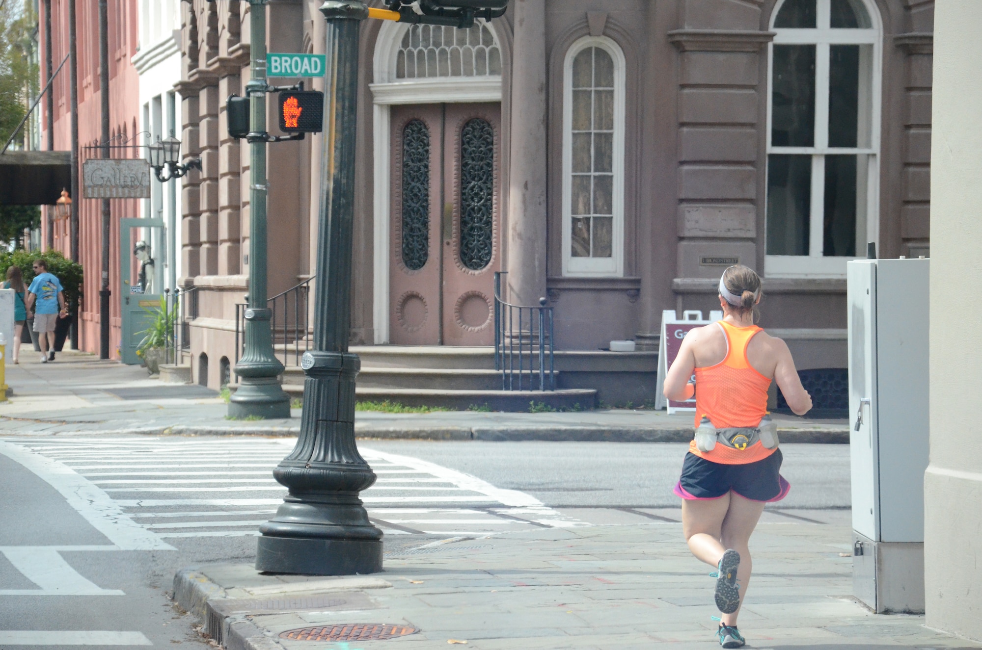 Janine Reinholtz, 20th Aerospace Medicine Squadron Health and Wellness Center community dietician, prepares to cross Broad Street as she makes her way through historic Charleston, S.C., April 13, 2013. Reinholtz ran as a part of Shaw Air Force Base’s Road Warriors Running Club which competed in the Palmetto 200, an overnight relay race from Columbia, S.C., to Charleston. (U.S. Air Force photo by 2nd Lt. Earon E. Brown/Released)