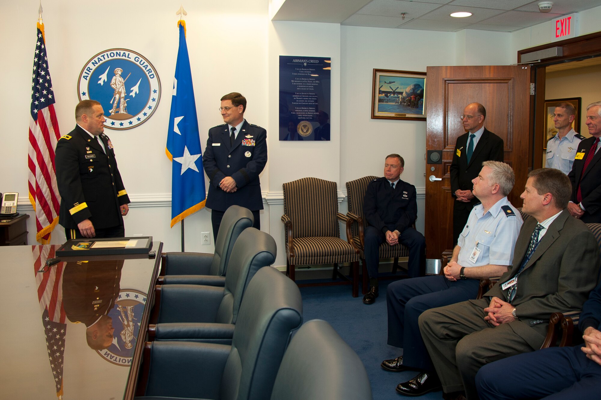 Army Major Gen. David S. Baldwin, the adjutant general of California, discusses the accomplishments of Air Force Brig. Gen. James C. Witham, the deputy director of the Air National Guard, during the presentation of the Order of California April 23, 2013 at the Pentagon, D.C. The Order of California, the state’s highest award, is awarded for exceptionally meritorious conduct in the performance of outstanding service to the state of California or the nation by a member of the California National Guard, State Military Reserve, or Naval Militia in a position of great responsibility. (U.S. Air National Guard photo by Master Sgt. Marvin R. Preston/RELEASED)