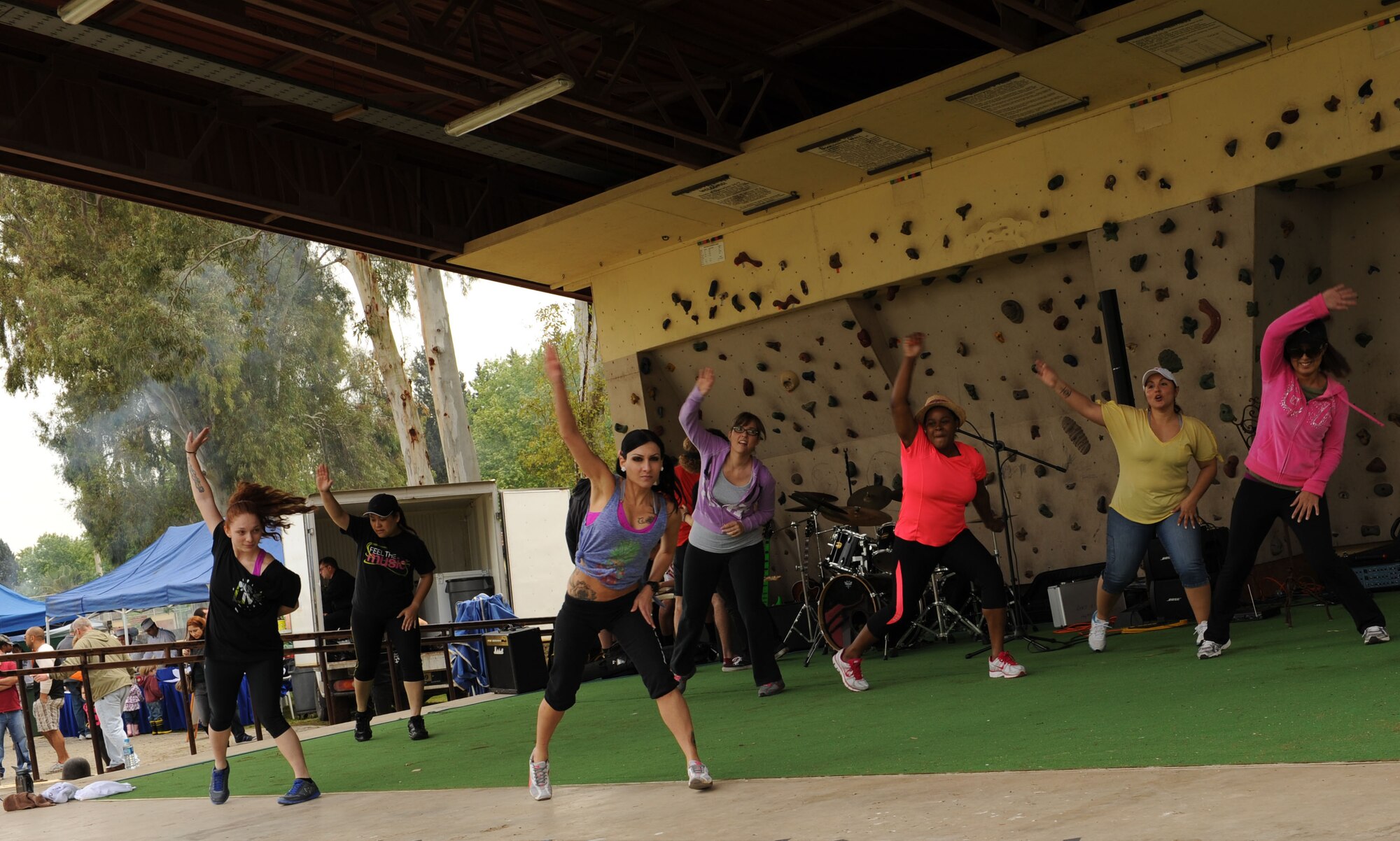 Women demonstrate a session of the Zumba fitness program during the annual Spring Fling event April 20, 2013, at Incirlik Air Base, Turkey. Contests, demonstrations and musical performers entertained the crowd from the events stage throughout the celebration. (U.S. Air Force photo by Senior Airman Chase Hedrick/Released)