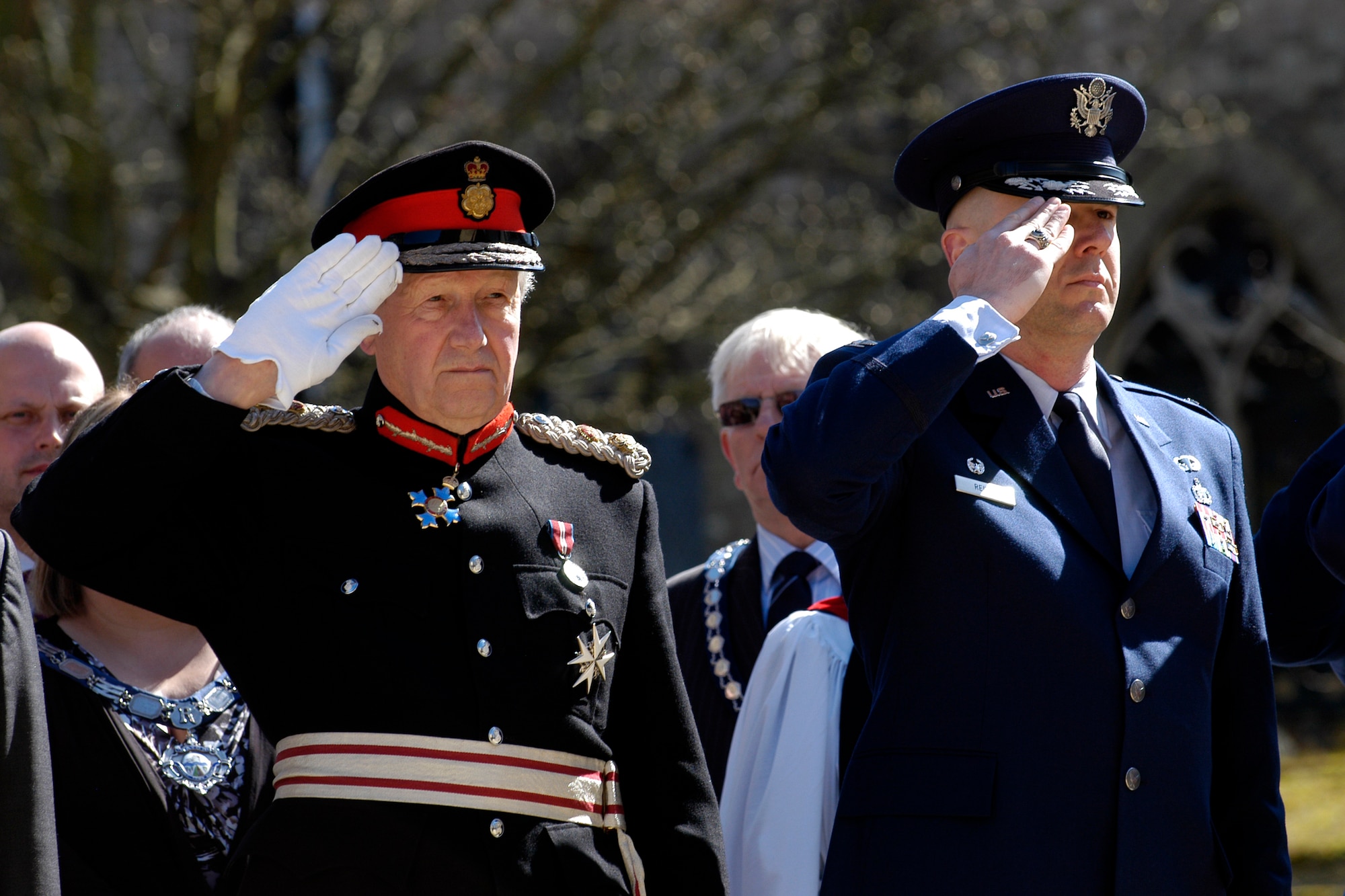 HUNTINGDON, United Kingdom – The Lord Lieutenant of Cambridgeshire Hugh Duberly, the Queen’s personal representative; and Col. Michael Reiner, 423rd Air Base Group commander, salute during the playing of the British and American national anthems in front of the Pathfinder House in Huntingdon April 20. march through the streets of Huntingdon April 20. The 423rd ABG marched through the streets of Huntingdon when the Huntingdonshire District Council granted the 423rd ABG the Freedom of the District of Huntingdonshire April 20 – this is the first time a U.S. Visiting Forces unit has been given this ancient honor. (U.S. Air Force photo by Tech. Sgt. Chrissy Best)