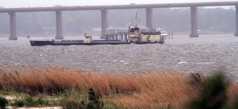 SUFFOLK, Va. – The hopper dredge Currituck arrived in Bennett’s Creek April 20, 2013 to remove shoaling in the federal navigation channel. The Wilmington, N.C.-based dredge will remove 4,000 cubic yards of sand -- the result of shoaling caused by natural transport and deposit of sediment. The shoaling, which was exacerbated by Hurricane Sandy, presents both safety and economic impacts for the maritime industry and nation. The dredging will increase the depth from 2 to 6 feet in half of the 60-foot channel.