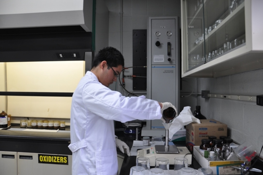 Daniel Stayt, a senior at the Seoul American High School, tests soil at the U.S. Army Corps of Engineers Far East District’s geotechnical and environmental engineering lab as part of the district's job shadowing program. This exchange program is part of the district’s the science, technology, engineering, and mathematics (STEM) program with the Department of Defense Dependent Schools Korea District.