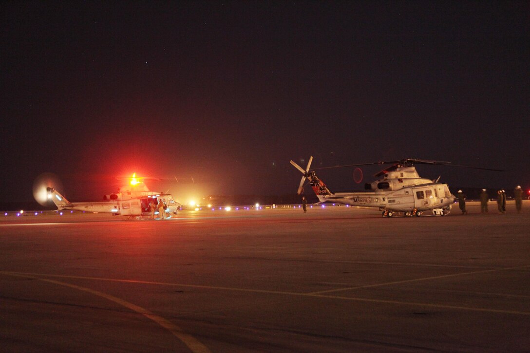 Marine Light Attack Helicopter Squadron 467’s new UH-1Y Venom rests on the flight line beside an UH-1Y with HMLA-167 based out of New River shortly after landing April 17. The “Sabers” are the last squadron Corps-wide to upgrade to the Venom from the UH-1N Huey. 

