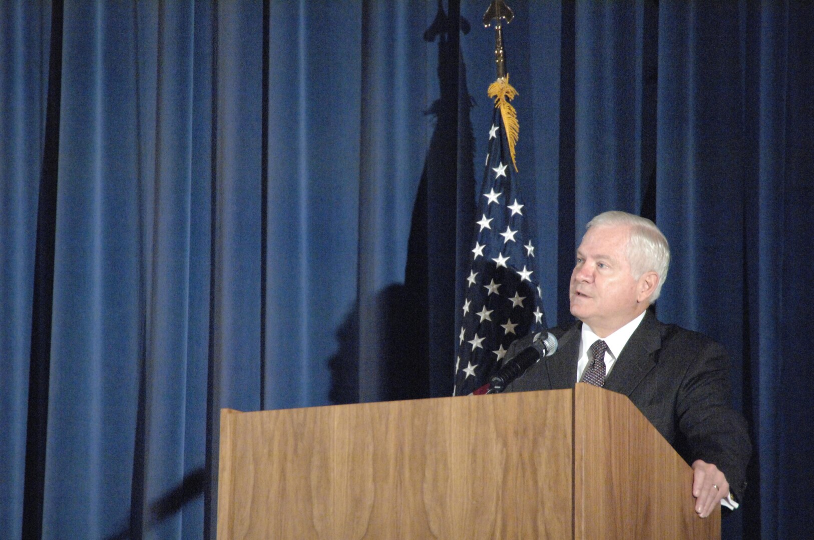 Secretary of Defense Robert M. Gates addresses personnel from Air Force Space Command at Peterson Air Force Base in Colorado Springs, Colo. June 10. Gates spoke to Airmen about the recent upheaval in senior Air Force leadership and the direction he would like to see the service move forward as new leadership appointees are approved by Congress and the President. Gates then answered the questions of service members before traveling to Scott Air Force Base to give a similar address. Photo by Petty Officer First Class Joaquin Juatai 